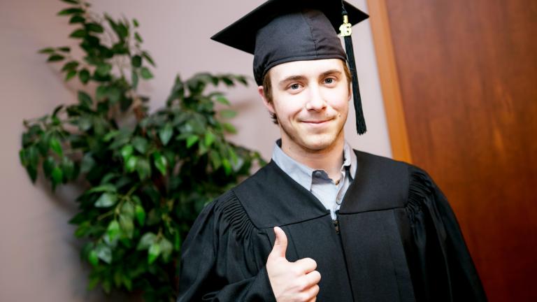 Student giving a thumbs up